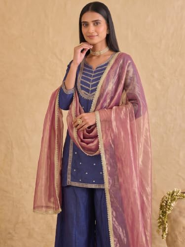 Varanga embroidered kurta set paired with a shimmering organza dupatta.