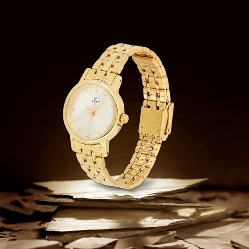 Titan Karishma Quartz Analog Champagne Round Dial Golden Stainless Steel Strap Watch for Women - NT2593YM01