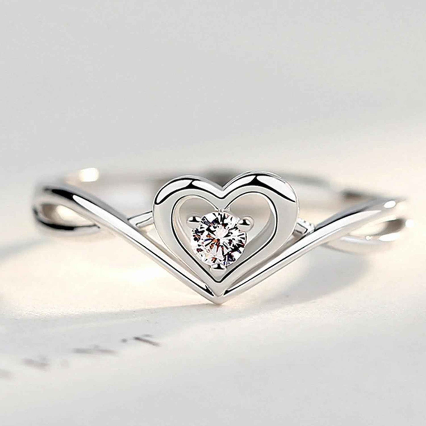 Okos Women Fashion Jewellery Rhodium Plated Solitaire Style Adjustable Heart Finger Ring with Cz Stone For Girls and Women FR1000970WHT