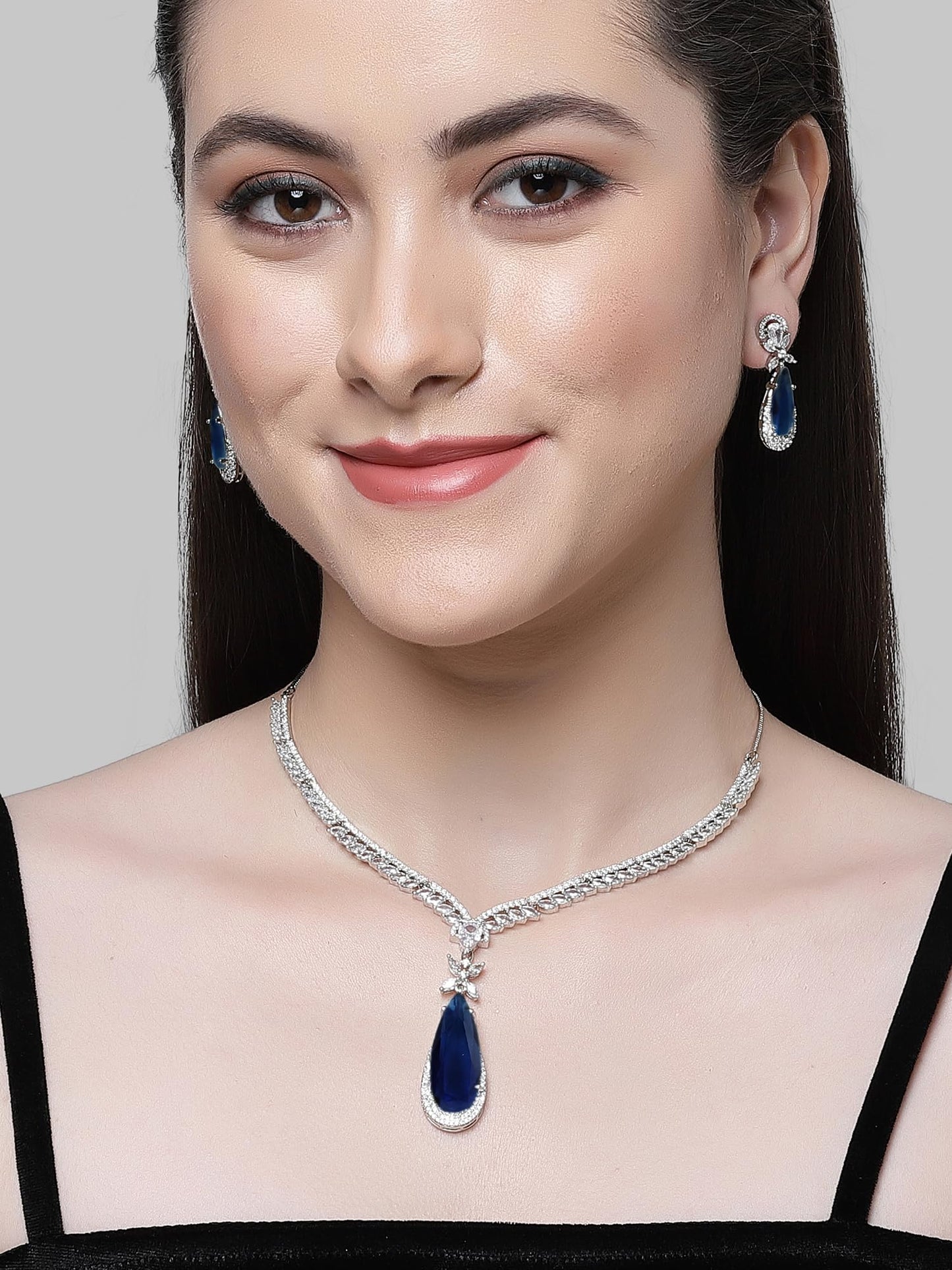Karatcart Silver Tone Blue Drop Shape American Diamond Studded Jewellery Set for Women