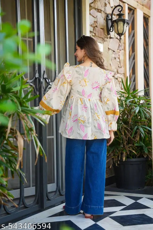 Cream colour cotton fabric printed oversized top for party and festive wear