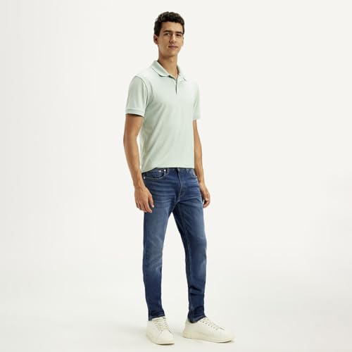 Levi's Men's Dark Indigo Tapered Fit Mid Rise Jeans