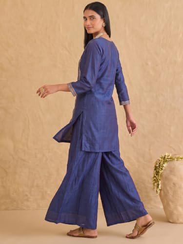 Varanga embroidered kurta set paired with a shimmering organza dupatta.
