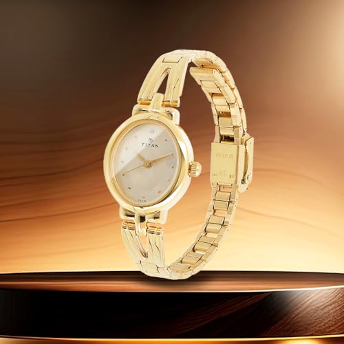 Titan Karishma Revive Analog Champagne Dial Women's Watch-NM2594YM01 / NL2594YM01