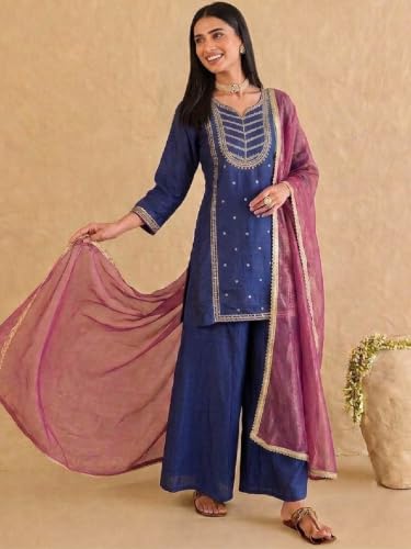 Varanga embroidered kurta set paired with a shimmering organza dupatta.