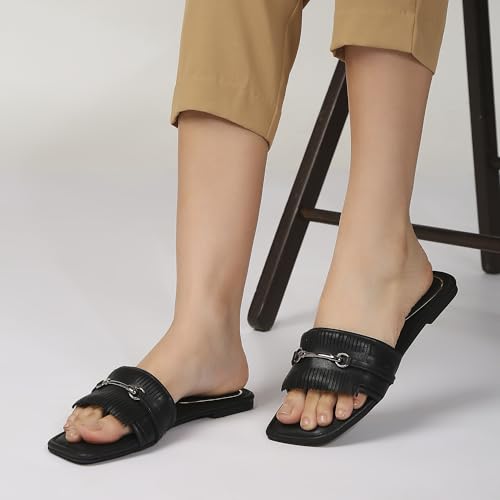 Kenneth Cole Women's Flat Slide Sandal | Premium Synthetic Upper | Ladies Open-Toe Slip-On, Cushioned Footbed | Distinctively Sculpted Vamp Strap, Gleaming Metallic Accent | Sophisticated, Effortless Contemporary Chic & Lasting Comfort | Black, EU37