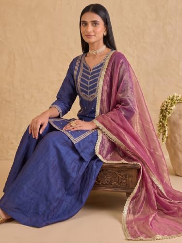 Varanga embroidered kurta set paired with a shimmering organza dupatta.