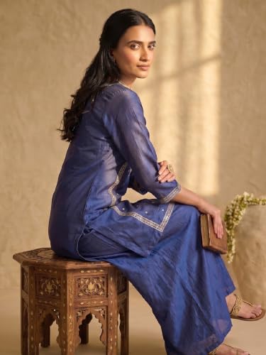 Varanga embroidered kurta set paired with a shimmering organza dupatta.