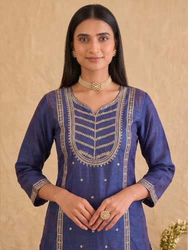 Varanga embroidered kurta set paired with a shimmering organza dupatta.