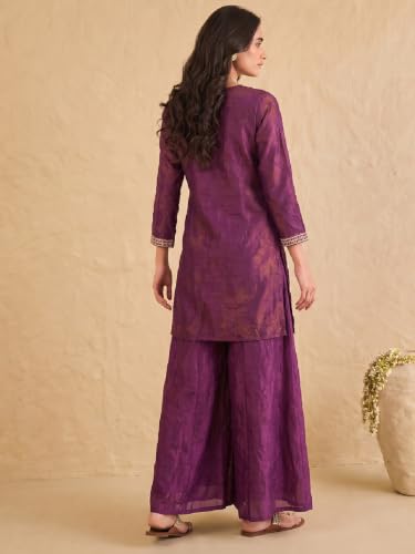 wine embroidered kurta set paired with a shimmering organza dupatta.