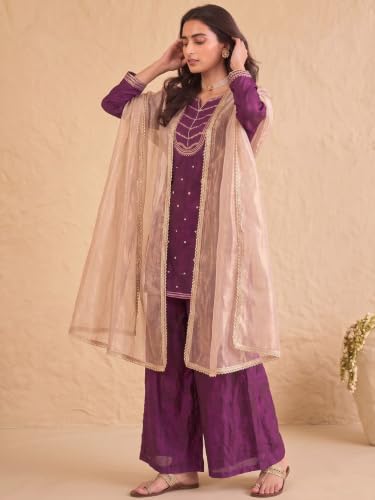 wine embroidered kurta set paired with a shimmering organza dupatta.