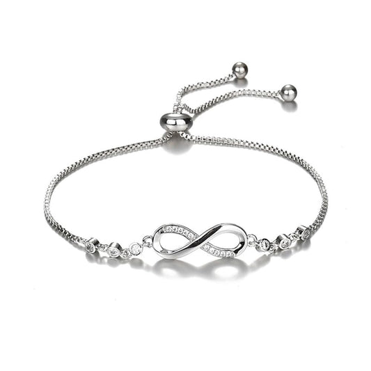 Shining Diva Fashion Latest Stylish Infinity Crystal Charm Silver Plated Bracelet for Women and Girls (10672b) Free Size