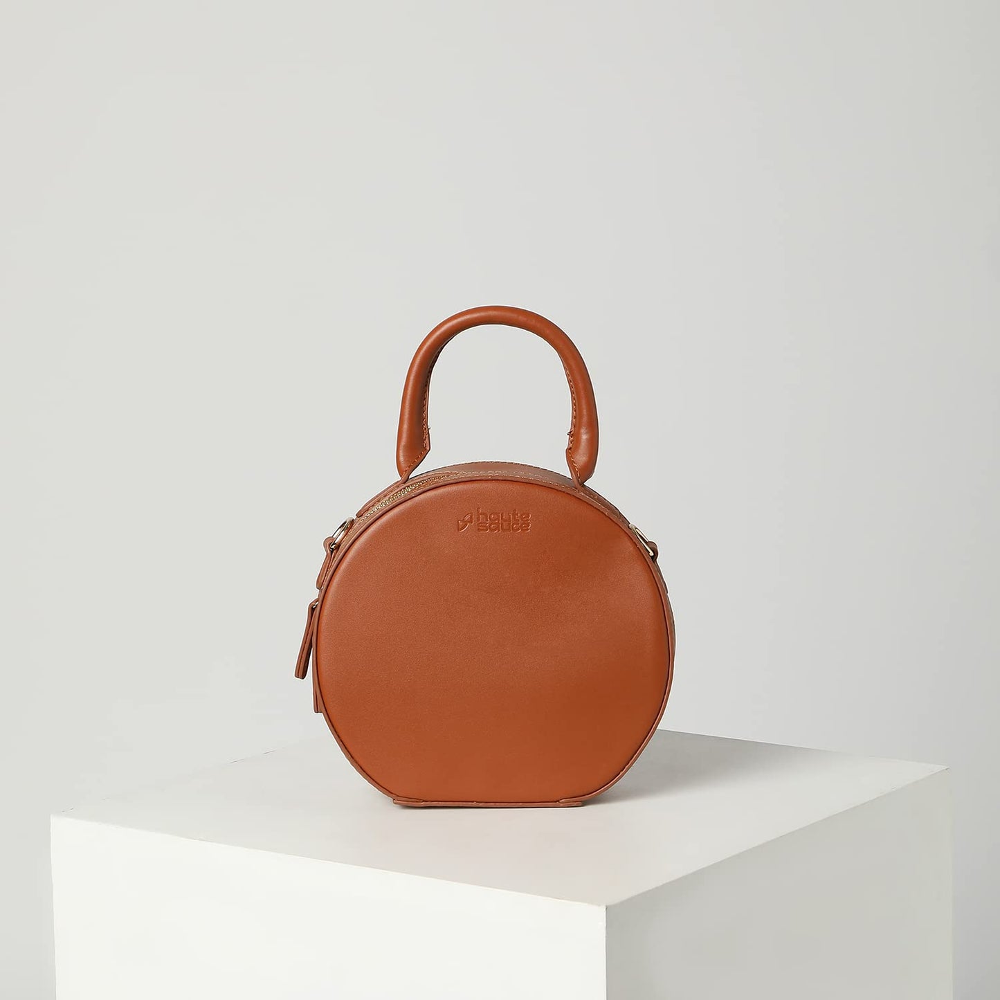 Haute Sauce Women round tan structured bag (HSHB1238)