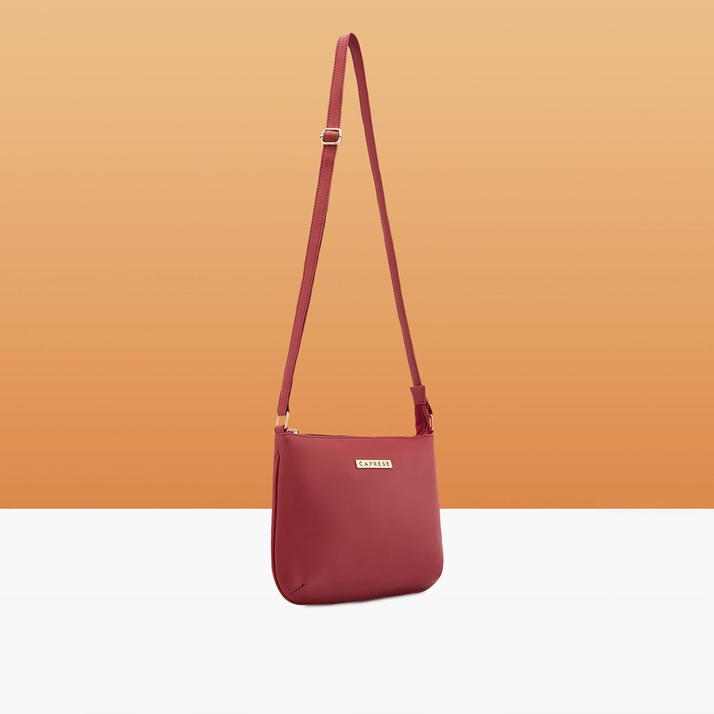 Caprese Rohde Sling Small Maroon Bag for Women|Adjustable Strap for Comfortable Wear|Stylish,Versatile Crossbody Bag for Everyday Use, Travel, and Special Occasions