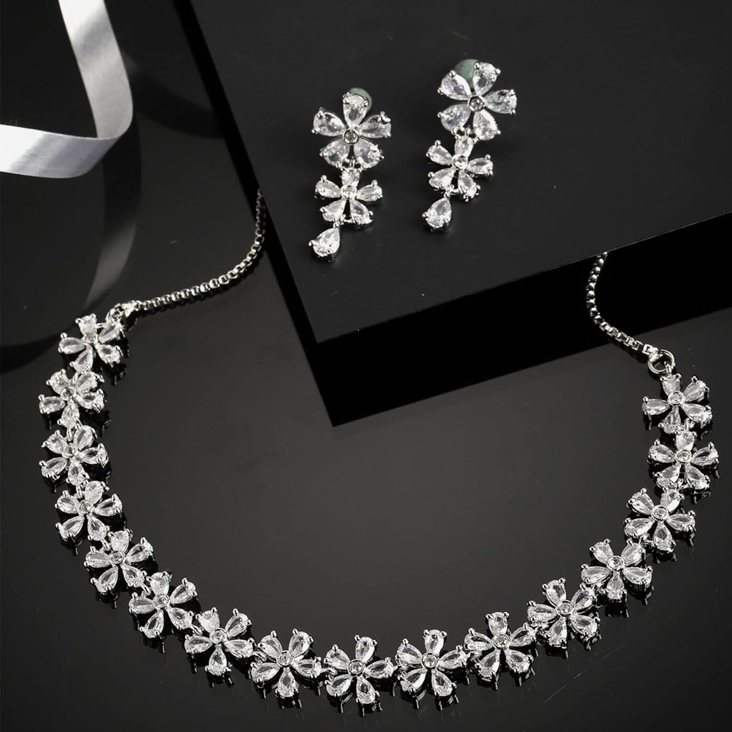 ZENEME Rhodium Plated Silver Toned White American Diamond Studded Flower Shaped Jewellery Set For Girls and Women (White)