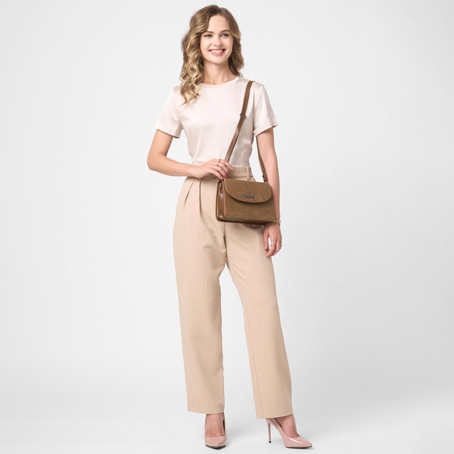 Caprese Flowy Medium Sling Bag for Women with Adjustable Strap & Magnetic Button Closure for Comfortable Wear | Versatile Handbag for Everyday Use, Travel, and Special Occasions (Brown)