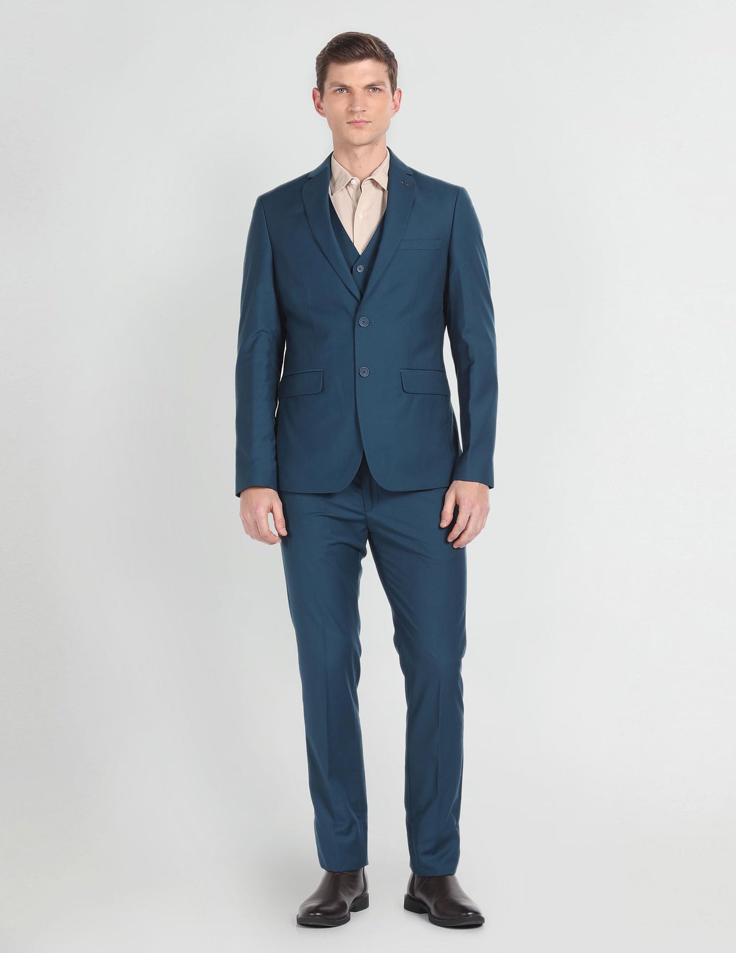 Arrow Solid Tailored Fit Three Piece Suit Teal