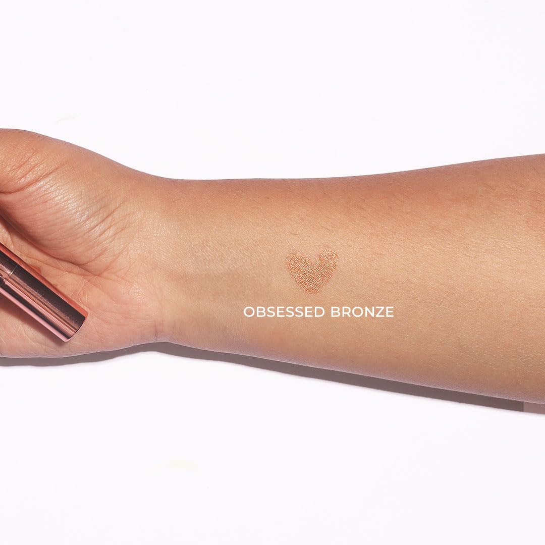 Makeup Revolution- Lustre Wand Shadow Stick- Obsessed Bronze | Ultra-pigmented & Shimmery lids | Seamless glide | Buildable, Metallic Formula | Sponge to dab & blend the shades-1.6 g