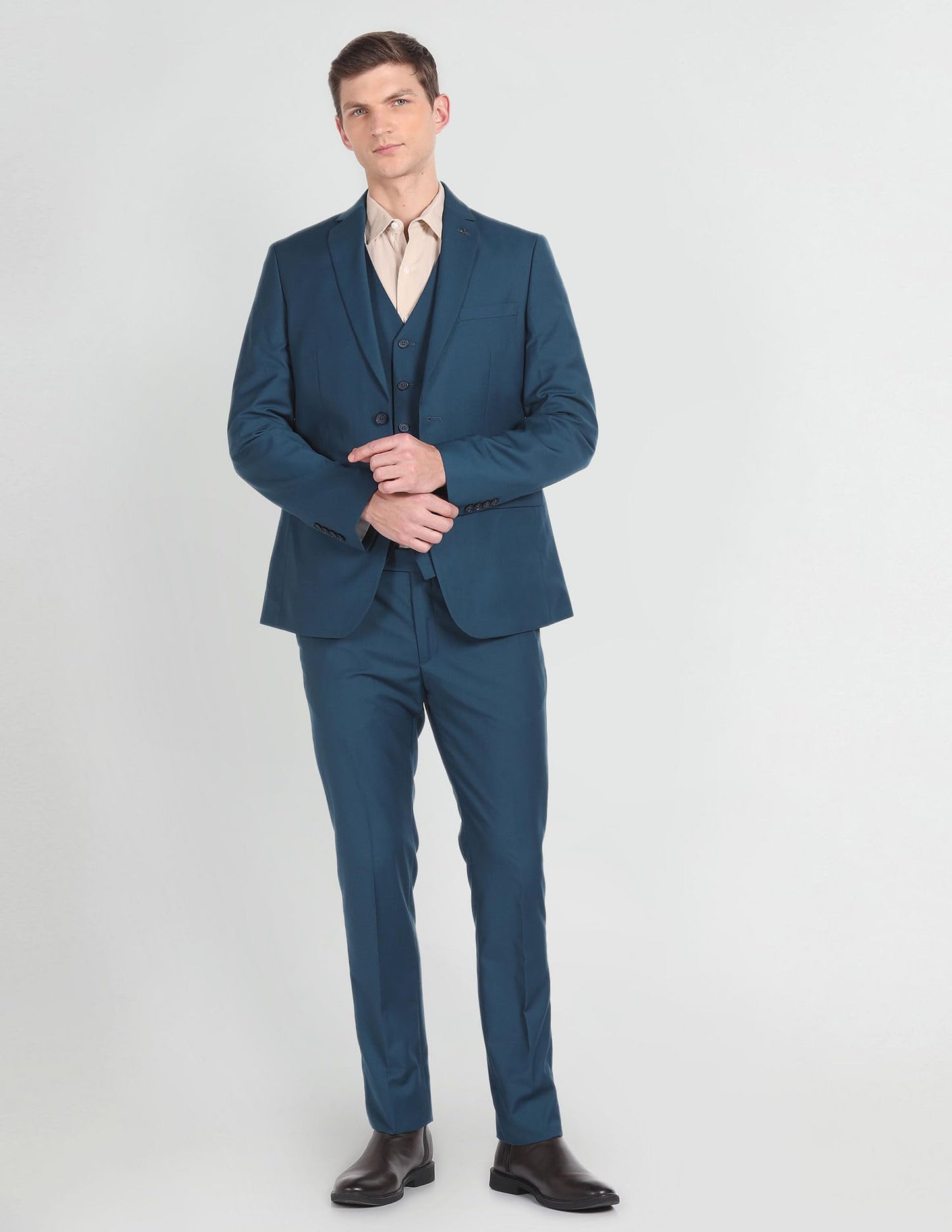 Arrow Solid Tailored Fit Three Piece Suit Teal