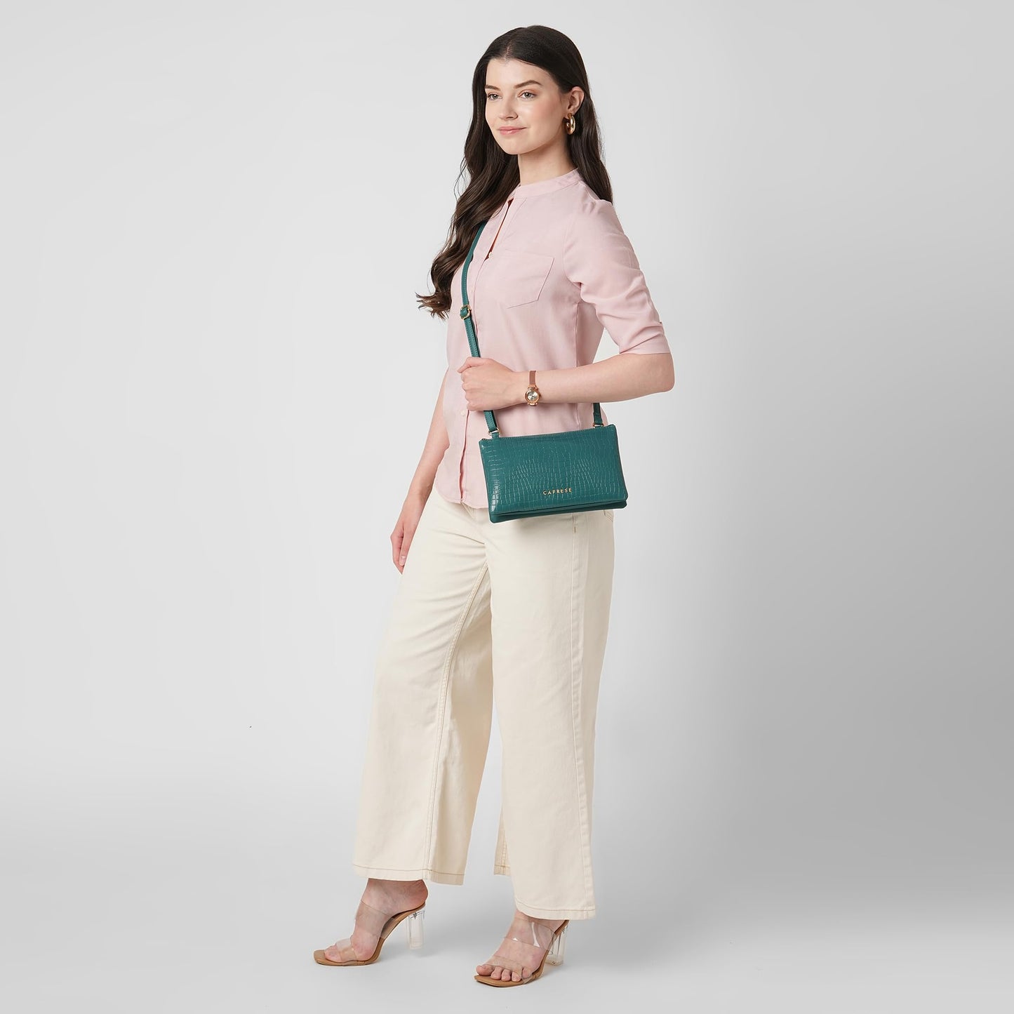 Caprese Suzie Sling Medium Bag for Women | Stylish Sling Bag with Adjustable Strap, Secure Zip Closure for Comfortable Wear | Versatile Handbag for Everyday Use, Travel & Special Occasions (Teal Blue)