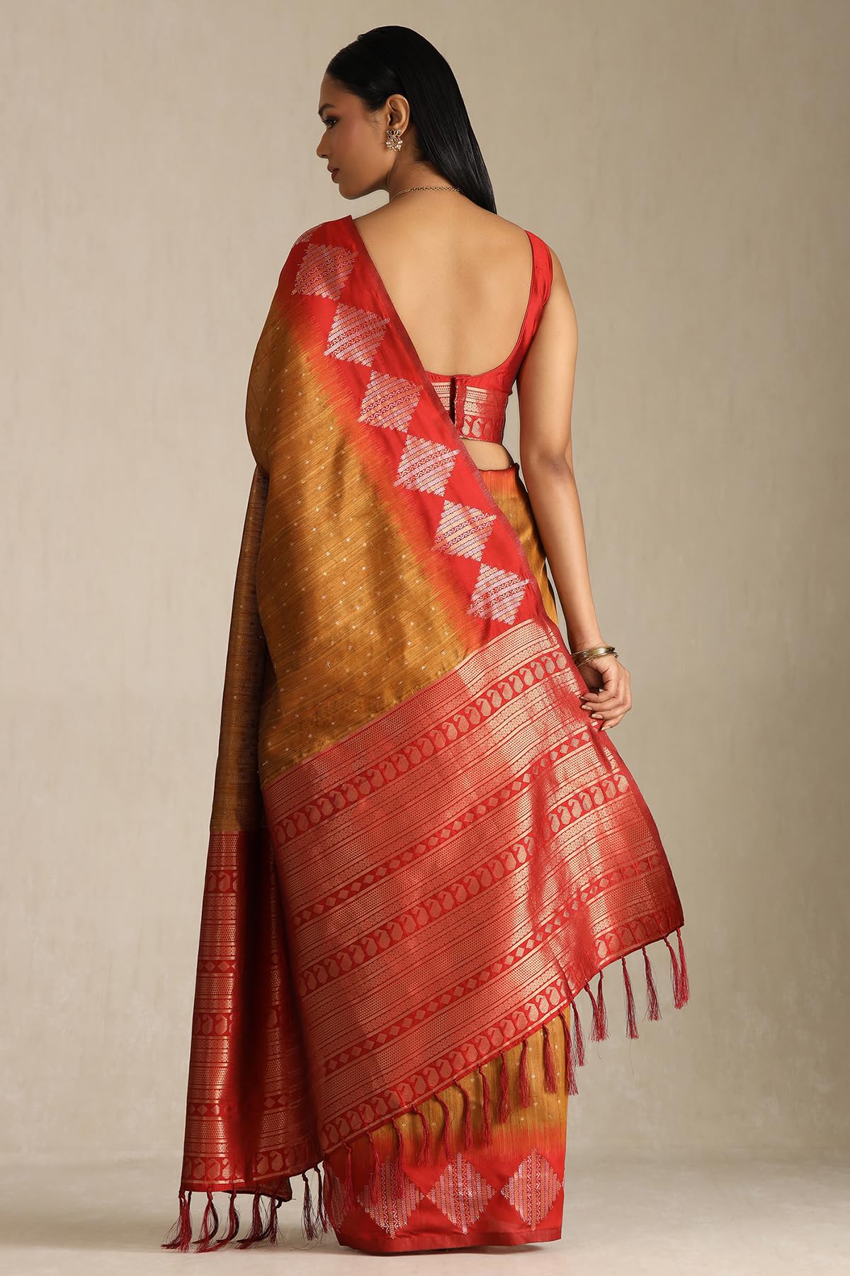 Soch Womens Mustard Tussar Zari Woven Saree With Zari Woven