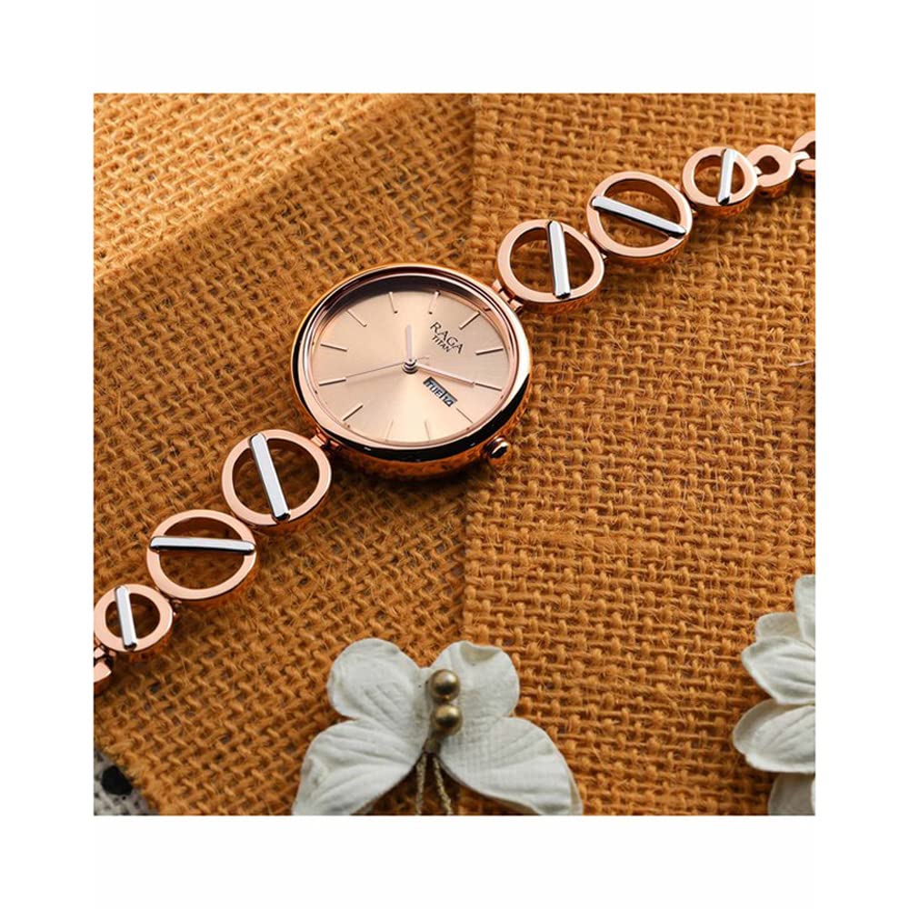 Titan Raga Viva Rose Gold Dial Women Analog Watch with Metal Strap-NS2644KM02/NT2644KM02