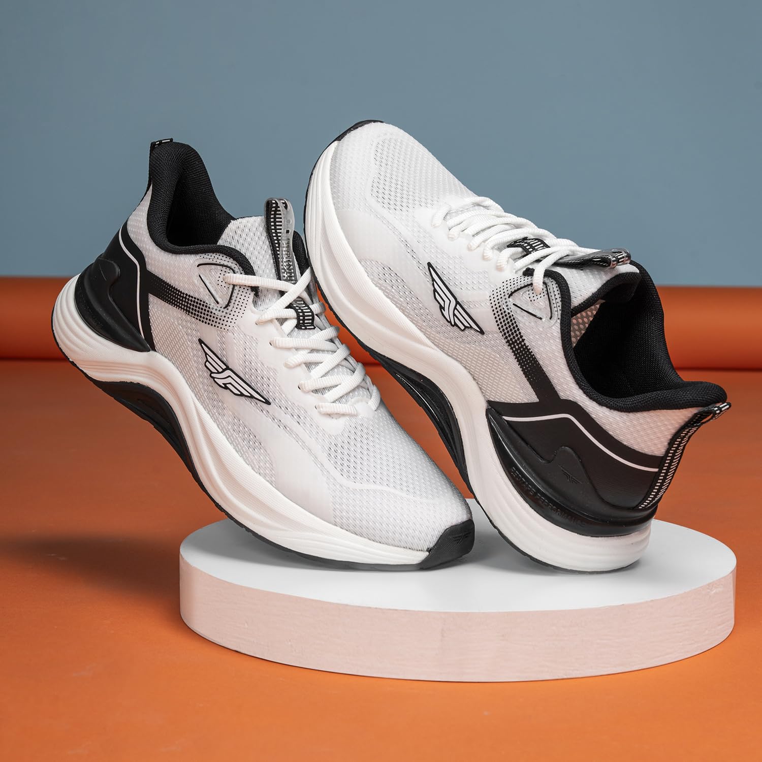 Red Tape Athleisure Sport Shoes for Men Cultured Round Toe Shape Cushioning Technology Smart Ventilation White