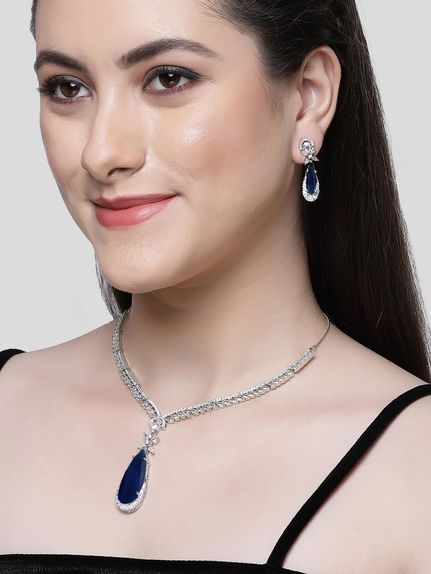 Karatcart Silver Tone Blue Drop Shape American Diamond Studded Jewellery Set for Women