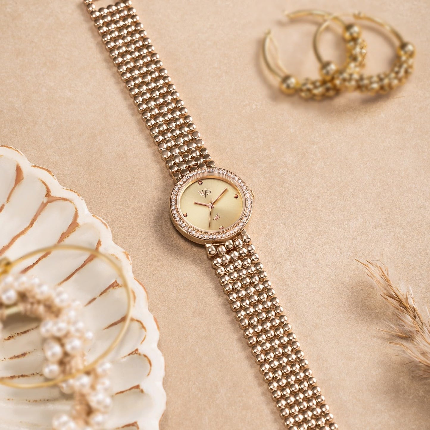 Fastrack Vyb Iconique Quartz Analog Light Peach Dial Rose Gold Alloy Strap Watch for Women - FV60111WM01W