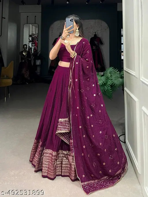 Experience timeless elegance with our Pure Chanderi Plain Lehenga, featuring an intricate Zari work border, perfectly paired with a sequin-embellished dupatta for added charm.