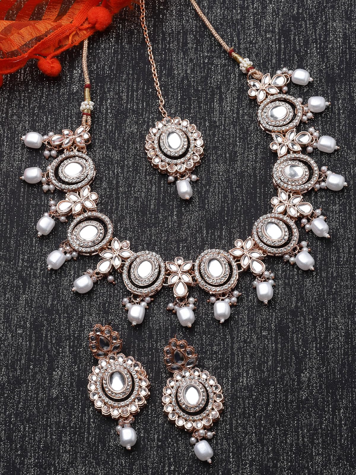 Sukkhi Traditional Gold Plated AD Stone Collar Bone Necklace Set With Earring And Maangtika | Jewellery Set For Women (NS105700)