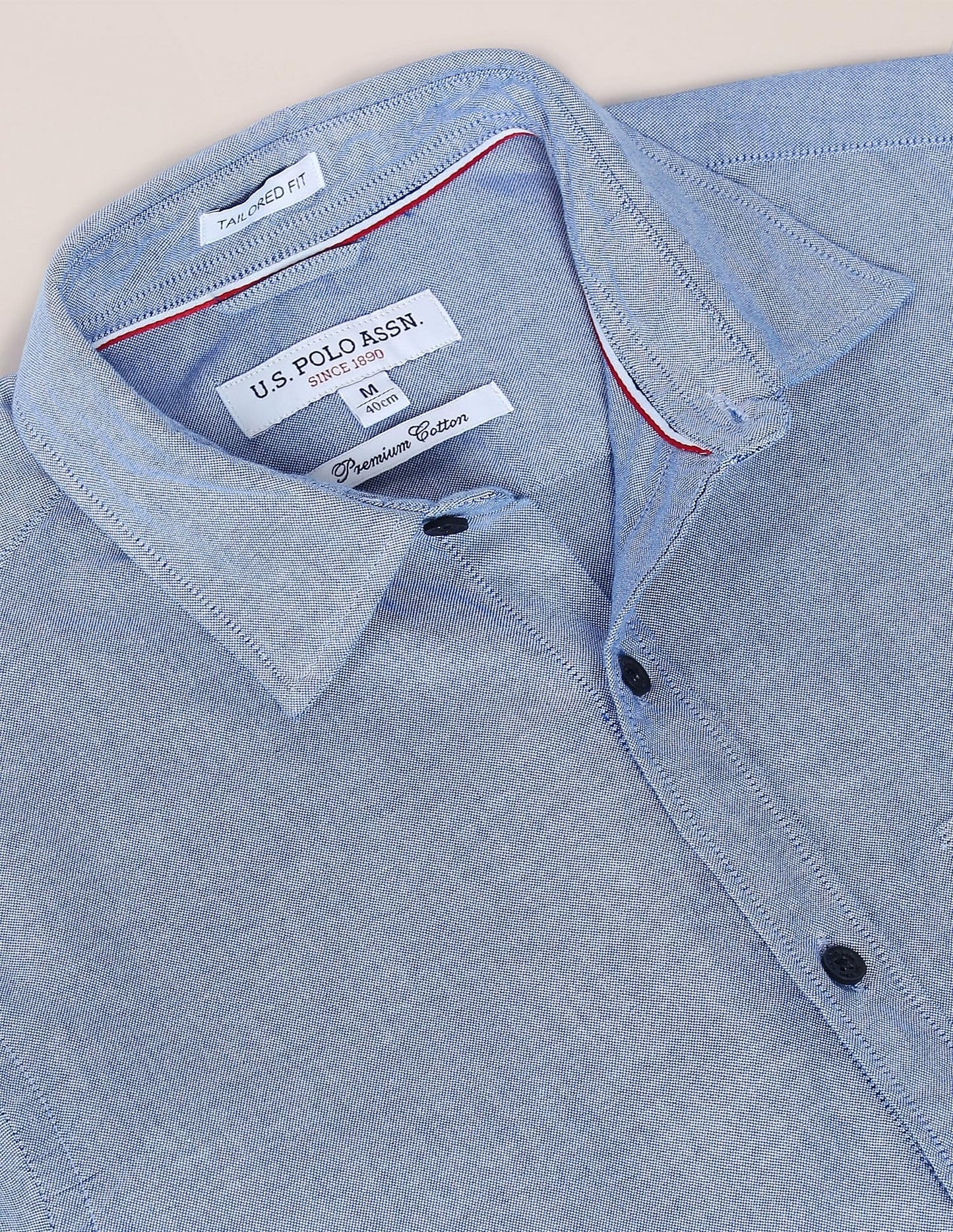 U.S. POLO ASSN. Men's Solid Spread Collar Premium Cotton Oxford Tailored Fit Shirt (USSHTR0027_DK. Blue_L)