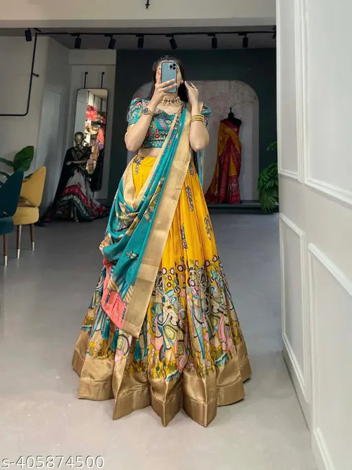 Women Adorned In The Elegance Of Dola Silk And The Intricate Charm Of Kalamkari Prints, The lehenga Choli Whispers Tales Of Tradition And Beauty.