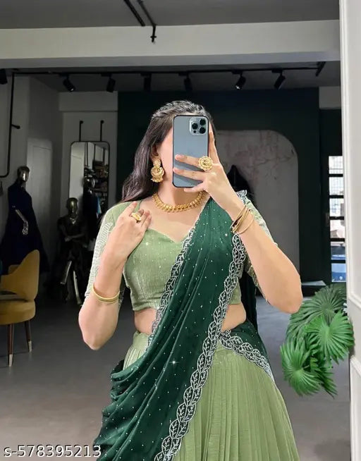 Pista Color Embroidery Work With Silk Lehenga Choli