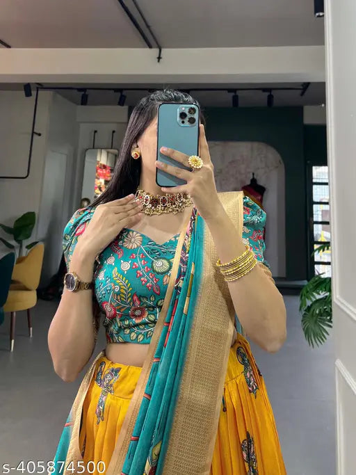 Women Adorned In The Elegance Of Dola Silk And The Intricate Charm Of Kalamkari Prints, The lehenga Choli Whispers Tales Of Tradition And Beauty.