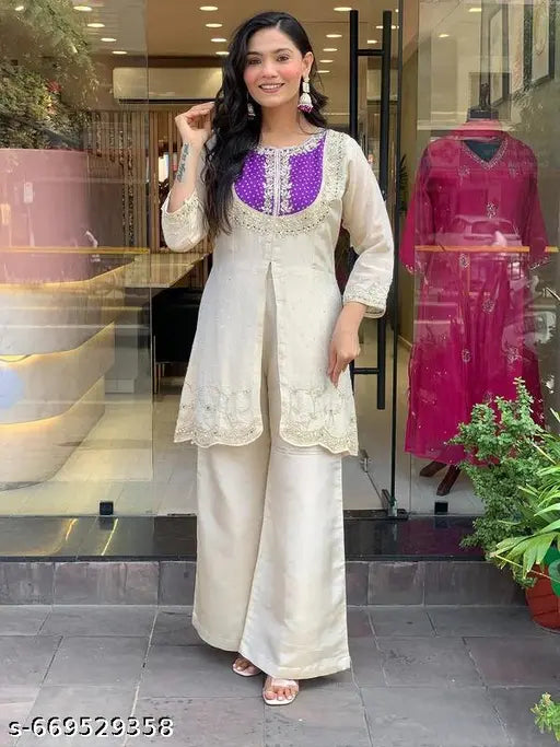 effortless grace to your ethnic collection with this elegants off-white kurti palazzo set