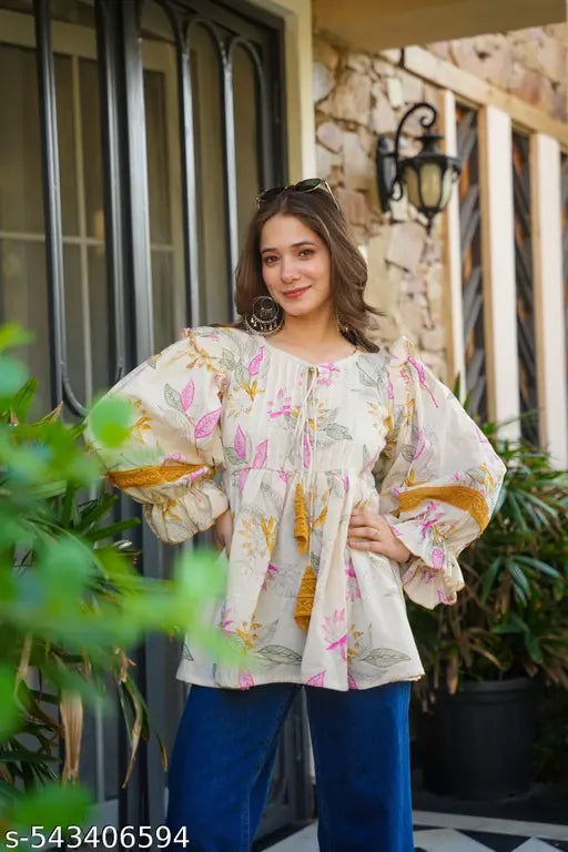 Cream colour cotton fabric printed oversized top for party and festive wear